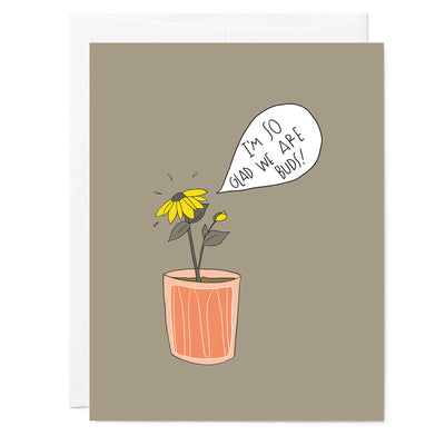 Hand illustrated greeting card with drawing of sunflower and little bud saying 'I'm so glad we are buds' in pink pot with green card background.