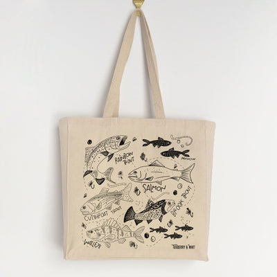 A canvas tote bag featuring illustrations of rainbow trout, cutthroat, walleye, minnow, salmon, and brook. Perfect for outdoor enthusiasts and adventure lovers. Made with high-quality materials and a modern illustration style. Use as a catch-all bag or to show off your love of fishing and the outdoors.