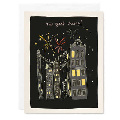 Illustrated holiday greeting card with new years fireworks city scene hand lettered text reads 'New Year's Cheers!', black background