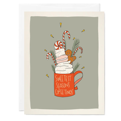 Illustrated holiday card with drawing of hot chocolate and peppermint sweets words say 'Sweetest Season's Greetings'