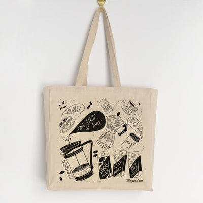 Coffee-themed tote bag featuring illustrations of espresso, French press, and a variety of milk options.