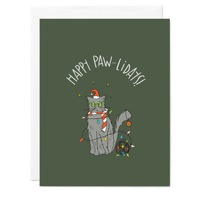 Hand illustrated greeting card with drawing of cat wearing Santa hat, Christmas Tree glasses, scarf, and colored Christmas lights. White hand lettered words read Happy Paw-lidays on dark green background.