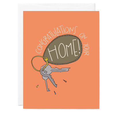 Hand illustrated greeting card that says Congratulations on your new home with a drawing of a set of keys. 