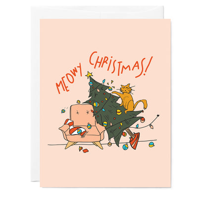 Hand illustrated greeting card of cat knocking Christmas tree onto a pink mid century chair with ornaments flying everywhere. Red hand lettered words read Meowy Christmas! on pink background.
